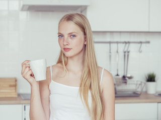 Woman kitchen home portrait lifestyle