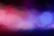 © New Africa - Blurred view of police cars on street at night