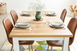 © Pixel-Shot - Served table in modern dining room