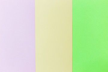 Pastel papers color background is nested backdrop flat lay. green, pink, orange