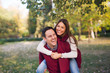 © Jelena - Couple enjoying autumn in the park.