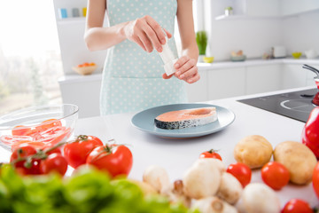 Sticker - Cropped photo of housewife hands lady fresh raw salmon fillet steak cook tasty meal garnish preparing ingredients add spices salt wear apron stand modern kitchen indoors