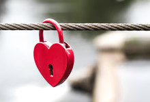 Close-up Of Heart Shape Love Lock Hanging On Rope
