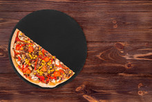 Half A Pizza With Mushrooms, Corn, Cherry Tomatos, Courgettes And Bell Peppers On A Slate Plate On The Wooden Table, Top View