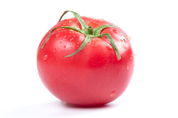 Red fresh tomato isolated on white background in close-up