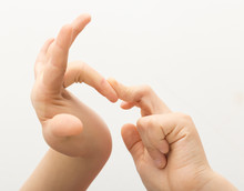 Flexible Human Fingers On A White Background