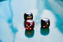 High Angle View Of Dice On Table