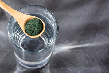 Sticker - Spoon with organic spirulina powder and glass of filtered water