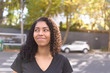 © Gustavo - Black woman on urban background in casual clothing