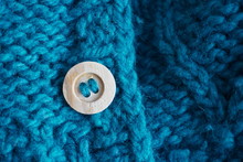Close-up Of Button On Woolen Jacket