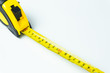 © Kannapat - Tape measure isolated on white background.