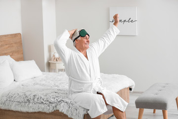 Sticker - Morning of happy mature man in bedroom