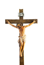 A Small Statue Of Jesus Christ On The Cross Isolated On White