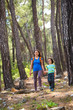 © zhukovvvlad - A child with his mother go hiking.