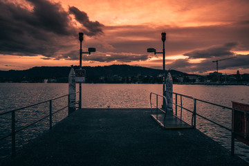 Wall Mural - sunset at the pier at lake zürich in Switzerland