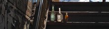 Vintage Bottles Of Different Colors And Shapes. Find In An Old Building.