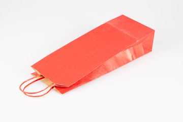 Canvas Print - Mockup red paper shopping bootle bag on white background