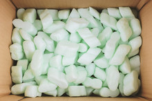 Cardboard Box Filled With Polystyrene Foam Peanuts Packaging Filler Cushioning Material