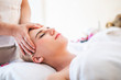 © totojang1977 - Beautiful young attractive Caucasian woman having head massage by Thai Masseur in spa salon. Beauty treatment and body care lifestyle concept
