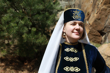 Woman in traditional Karachai clothes