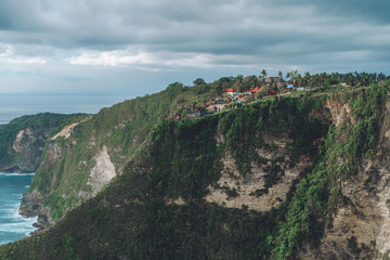 Photo of a high mountain with houses on top