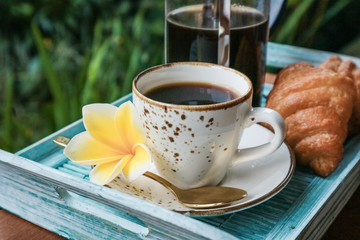 Wall Mural - Cup of coffee with croissant