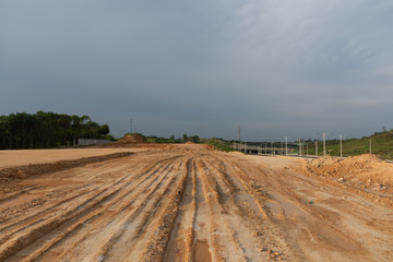 Wall Mural - Dirt wheel printed road perspective horizon landscape