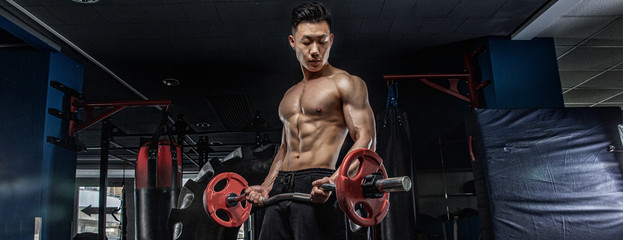 Asian man exercising in the gym, fitness, health, body good.