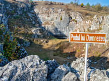A Sign Indicating God's Bridge (Podul Lui Dumnezeu), A Natural Bridge Created By The Colapse Of A Cave
