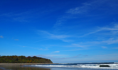 The beautiful Atlantic Ocean under a cloudy sky is a dramatic seascape. It is a great place for walking along the shore, swimming, fishing or just lying on towel for well-earned rest and relaxation.