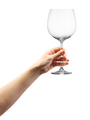 Wall Mural - Woman hand holding empty wine glass isolated on white.