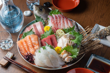 Wall Mural - authentic japanese sashimi platter with sake