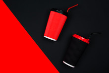 Black, Red Paper Cup Of Coffee On Red, Black Background. Tasty Morning Hot Takeaway Drink, Layout For Coffee Shop. Concept Of Business And Services. Trendy Hipster Design, Modern Abstraction.