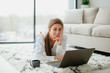 © Катя Іваськевич - young woman working on laptop at home. work at home.  laptop. stay at home.