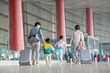 © View Stock - A happy family with luggage at the airport