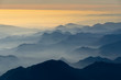 © Cavan Images - Scenic view of mountains during sunrise