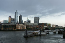 View Of London's City Centre And The Thames River At Sunset