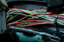 Close Up Of The Engine Control Unit Of The Car, Multicolored Wires Plug  - A Wiring Of A Truck Car