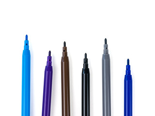 A set of six markers isolated on a white background.