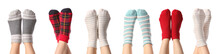 Legs Of Young Women In Different Socks On White Background