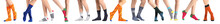 Legs Of People In Different Socks On White Background