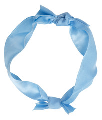 Wall Mural - Blue ribbon curl isolated on white background. Bright blue ribbon bow and curl isolated on white background. Textile accessories for sewing and gift scrapbooking decorations. Atlas or silk ribbon