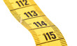 © michaklootwijk - Close-up of a yellow measuring tape isolated on white - 114