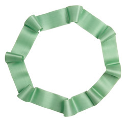 Wall Mural - Green ribbon curl isolated on white background. Bright green ribbon bow and curl isolated on white background. Textile accessories for sewing and gift scrapbooking decorations. Atlas or silk ribbon