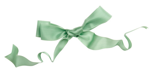 Wall Mural - Green ribbon curl isolated on white background. Bright green ribbon bow and curl isolated on white background. Textile accessories for sewing and gift scrapbooking decorations. Atlas or silk ribbon