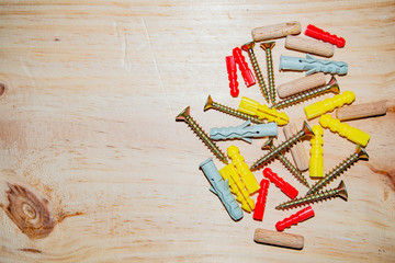 Kit of working tools on wooden background