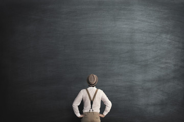 Wall Mural - man in front of a chalkboard