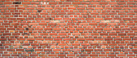Wall Mural - texture of an old red brick wall as background or wallpaper