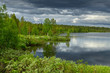Picturesque summer landscape with heavy thunderclouds. Finnish Lapland, Suomi