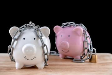 Chained piggy bank and lock money savings with chain and keys. Money security concept